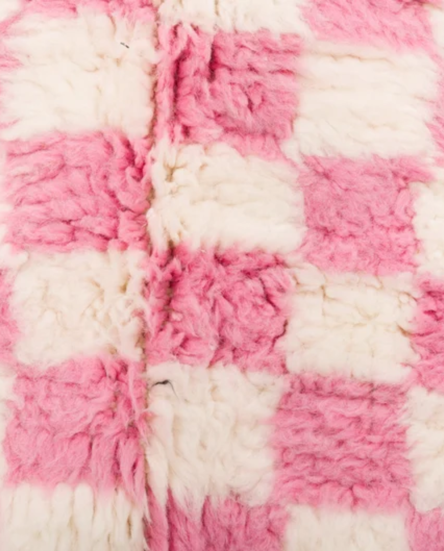WARDA Beni Ourain pink checker grid Moroccan rug close-up showing hand-knotted wool texture and pile detail, by NURA
