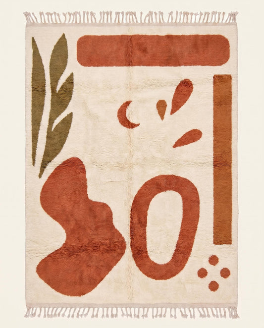 Plush Azilal Moroccan rug featuring playful organic abstract shapes in terracotta and olive green on a cream wool pile by NURA.