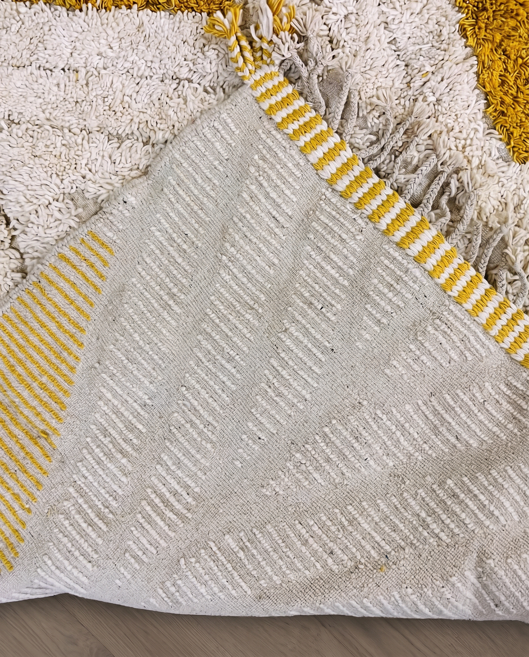 YARA Beni Ourain ivory bold diamond lattice Moroccan rug back view showing traditional handwoven construction, by NURA