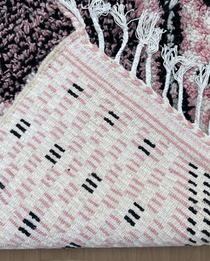 YOUSRA Azilal pink bold diamond lattice Moroccan rug back view showing traditional handwoven construction, by NURA
