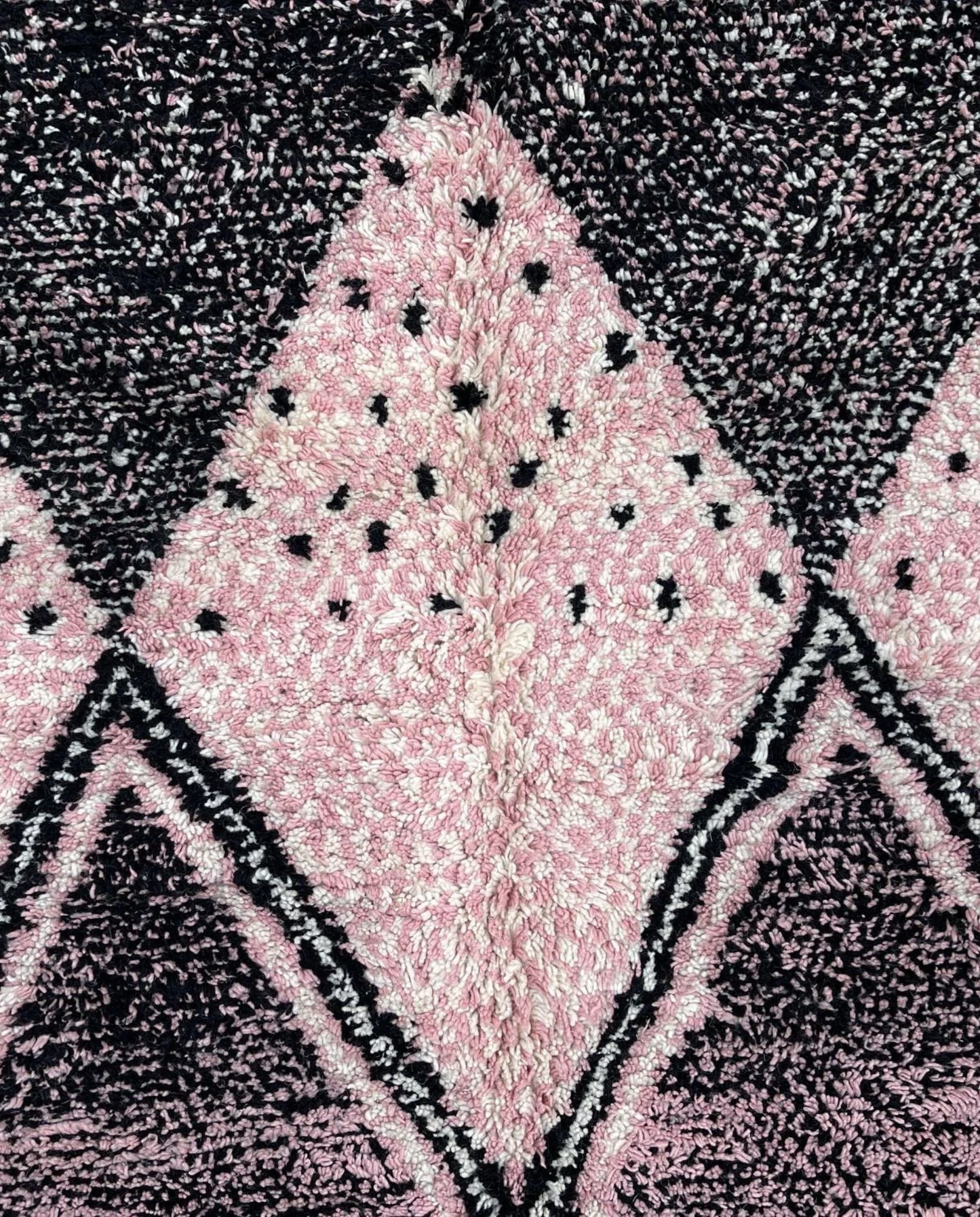 YOUSRA Azilal pink bold diamond lattice Moroccan rug close-up showing hand-knotted wool texture and pile detail 1, by NURA