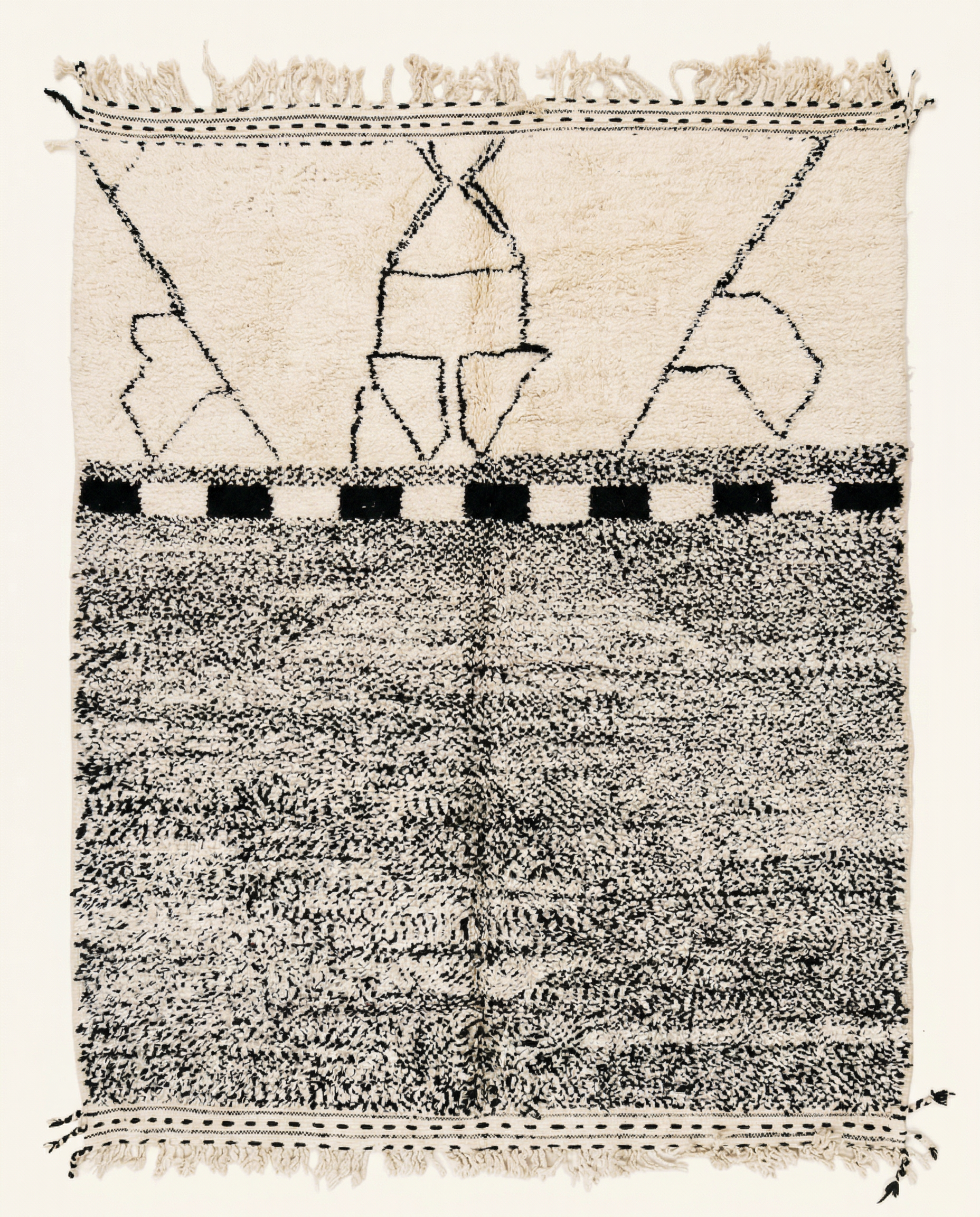 Plush ivory Beni Ourain Moroccan rug with a bold black panelled checkerboard design and high pile, by NURA.
