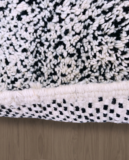 ZAINA Beni Ourain ivory panelled checkerboard Moroccan rug close-up showing hand-knotted wool texture and pile detail 2, by NURA