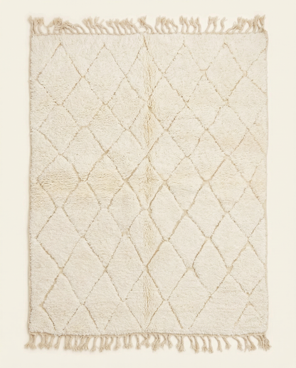 Plush ivory Beni Ourain Moroccan rug with a carved diamond lattice pattern and a thick high pile, by NURA.