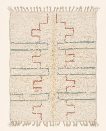 Plush cream Beni Ourain Moroccan rug featuring stepped blush motifs and delicate powder blue bands by NURA.