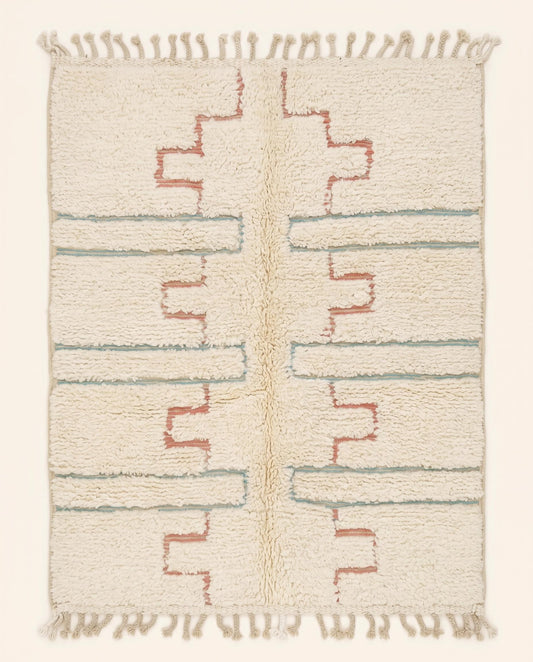 Plush cream Beni Ourain Moroccan rug featuring stepped blush motifs and delicate powder blue bands by NURA.
